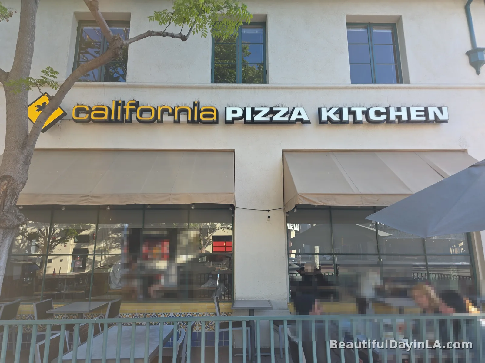Exterior storefront of California Pizza Kitchen in Westwood Village