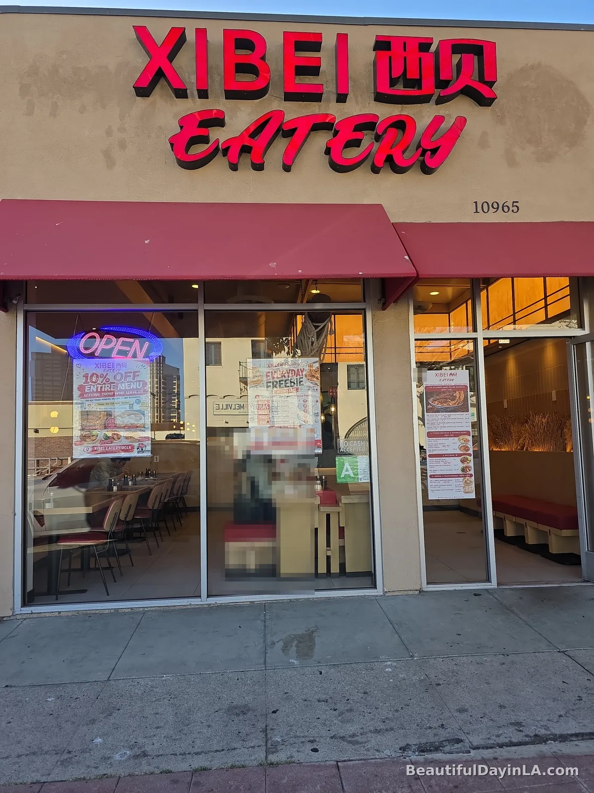 Storefront and menu signage of Xibei Eatery in Westwood Village